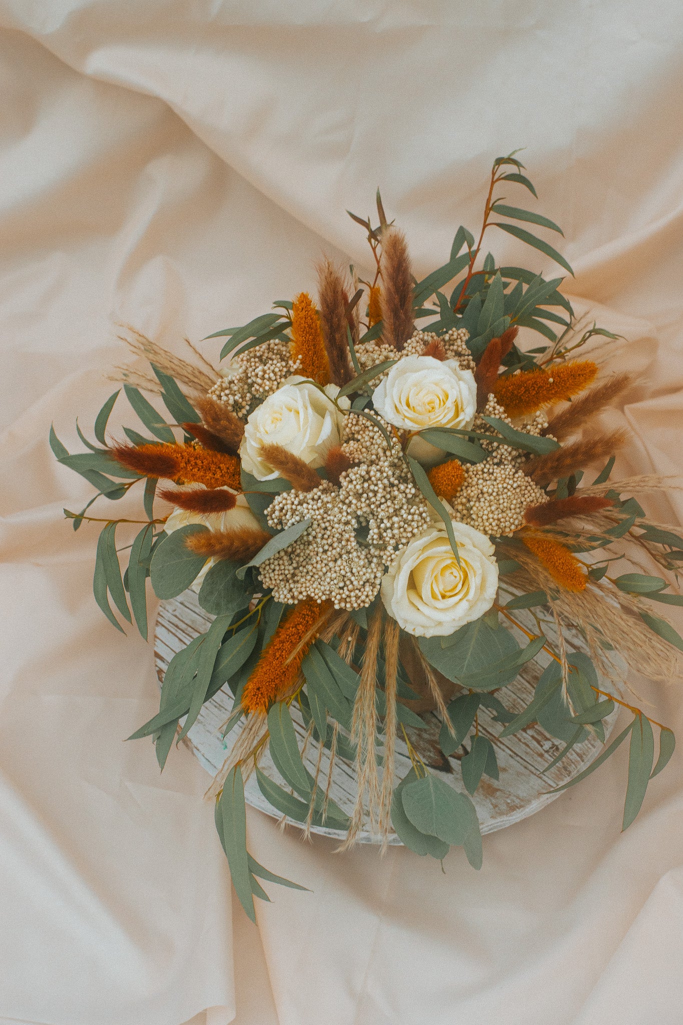 "Café Latte" flower arrangement in a pumpkin vase