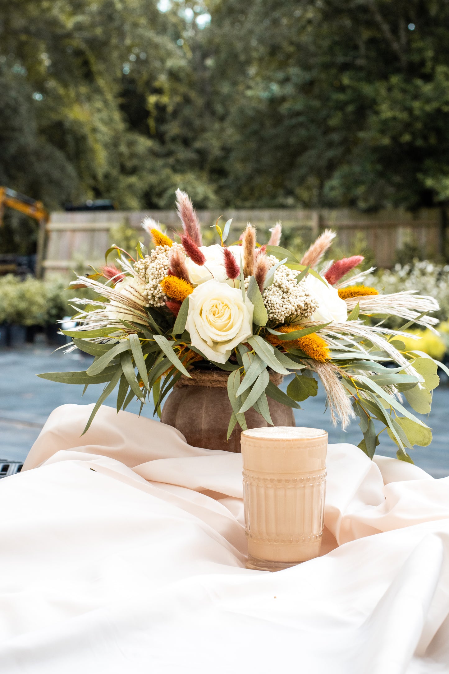 "Café Latte" flower arrangement in a pumpkin vase