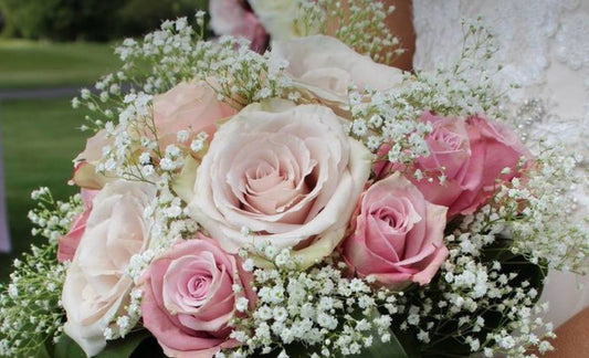 Dusty pink roses  & baby's breath prom bouquet & boutonniere set